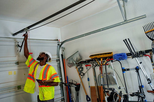 Professional Garage Door Panel Replacement technician working in East Falmouth, MA